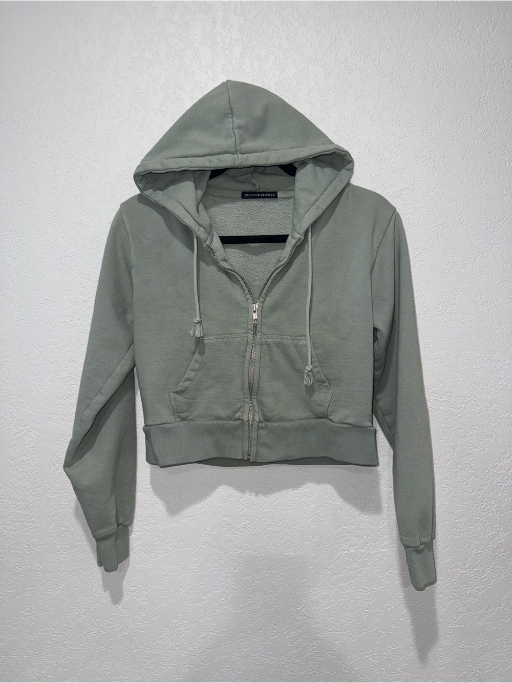 Brandy Melville sage green cropped zip up hoodie